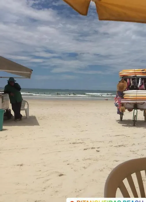 Apartamento na praia com estacionamento Pé na areia Guarujá-1